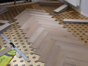 laying floor in a house